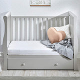 The side panels are easily removable, allowing you to either convert the bed into a daybed/sofa or a toddler bed.