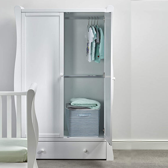 Behind two-sided doors, you will find a spacious interior with a railing where you can hang on your little one's clothing.