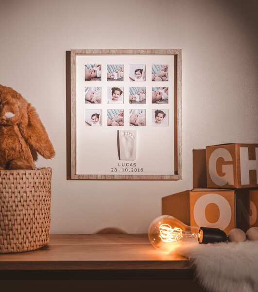 This unique frame is a special way to create a lovely keepsake and memory of your baby's first year and makes an ideal gift