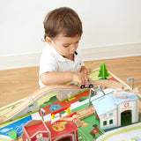 85 detailed pieces of a train track and objects including fire station, fire engine, hospital, ambulance, doctor and more