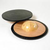 Estas tablas de equilibrio de alta calidad están hechas de madera natural y caucho y tienen 35 cm de diámetro.