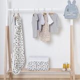 This open clothes rack in a fun teepee style is ideal for parents following the Montessori method of learning