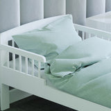 Little Helpers toddler solid pine bed in a crisp white is 144cm long x 75cm wide x 57 cm high and takes cot bed mattresses