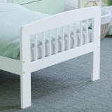 Curved edges make up this stylish white eco solid pine toddler bed from Little Helper