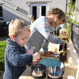 This heavy duty mud kitchen is big enough for two children to work alongside creating mud masterpieces