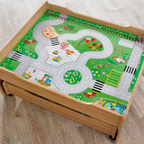 The table top features a reversible design which can be used with or without the train set or with toy cars and trucks